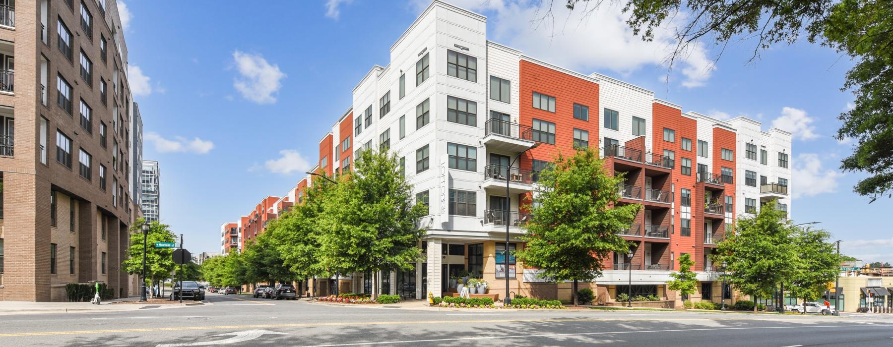 a street view of a multi story building