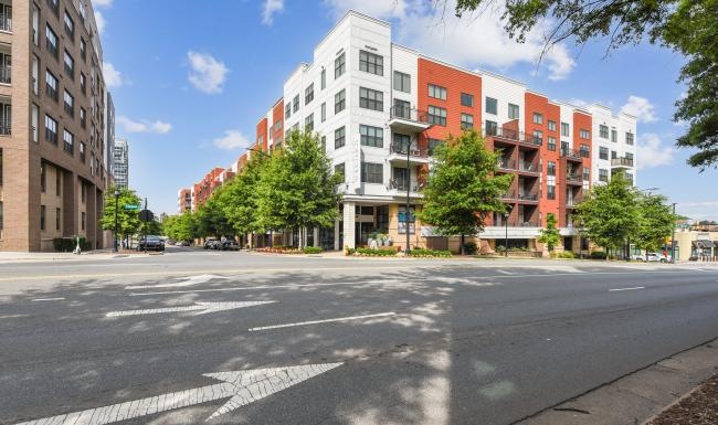 a street view of a multi story building